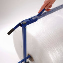 Dérouleur horizontal de papier bulle avec cutter incorporé au dérouleur